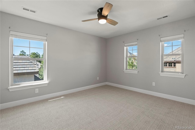 6877 Northstar Ct, Castle Rock, CO 80108 - spare room with healthy amount of natural light, light colored carpet, and ceiling fan