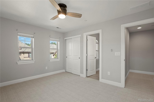 6877 Northstar Ct, Castle Rock, CO 80108 - unfurnished bedroom featuring light colored carpet, a closet, and a ceiling fan