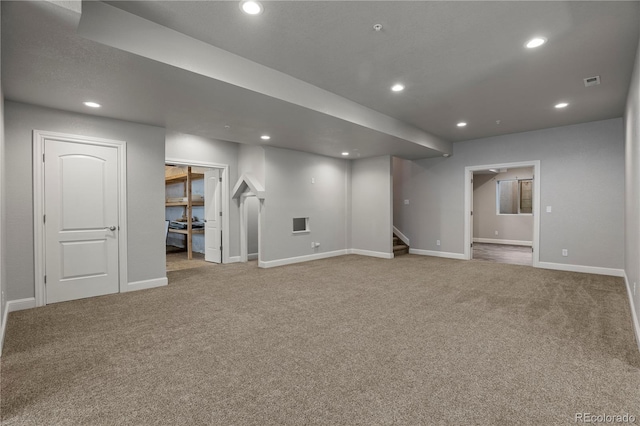 6877 Northstar Ct, Castle Rock, CO 80108 - finished basement with carpet, stairway, and recessed lighting