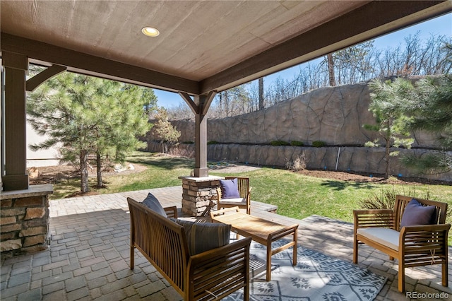 6877 Northstar Ct, Castle Rock, CO 80108 - fenced backyard featuring a patio area and outdoor lounge area