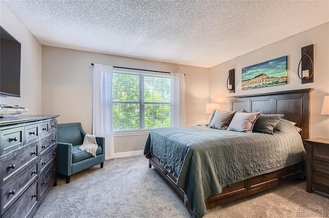 8252 S Fillmore Cir, Centennial, CO 80122 - bedroom with light colored carpet and a textured ceiling