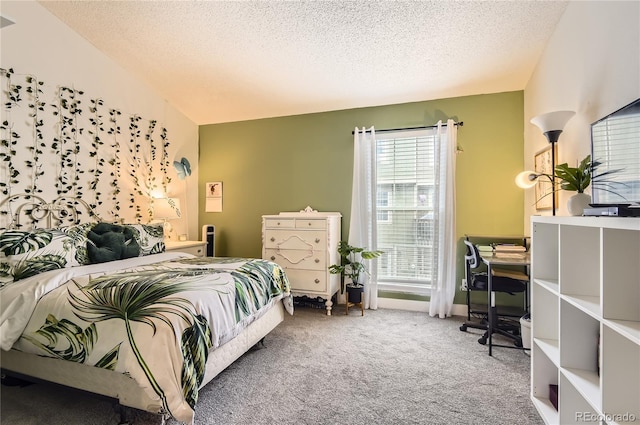 8252 S Fillmore Cir, Centennial, CO 80122 - carpeted bedroom featuring a textured ceiling and vaulted ceiling