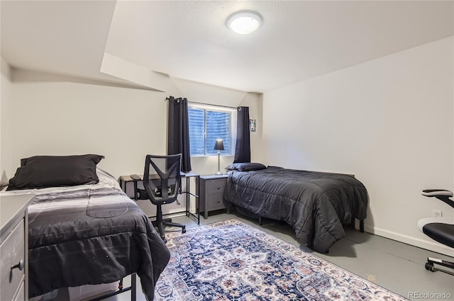 8252 S Fillmore Cir, Centennial, CO 80122 - bedroom with concrete flooring and baseboards