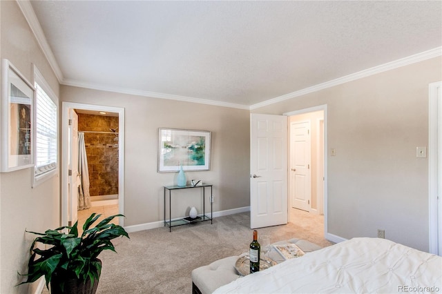 bedroom with crown molding, baseboards, light carpet, and ensuite bathroom