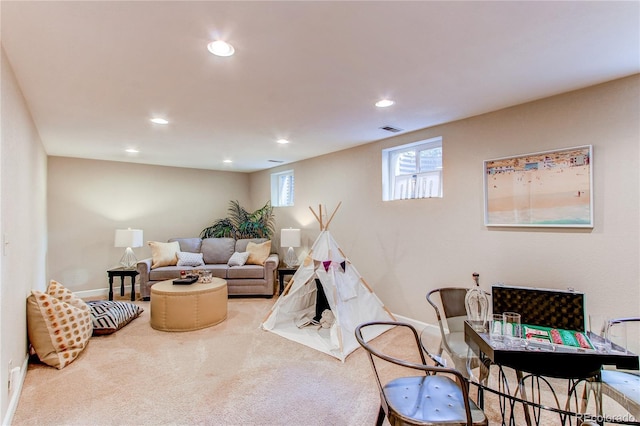 living room with visible vents, recessed lighting, baseboards, and carpet floors