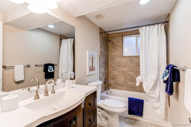 bathroom with visible vents, tile patterned flooring, vanity, toilet, and shower / tub combo