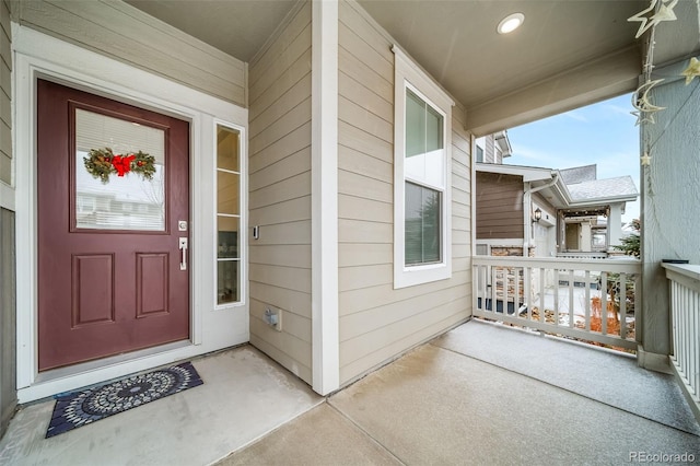 property entrance with covered porch