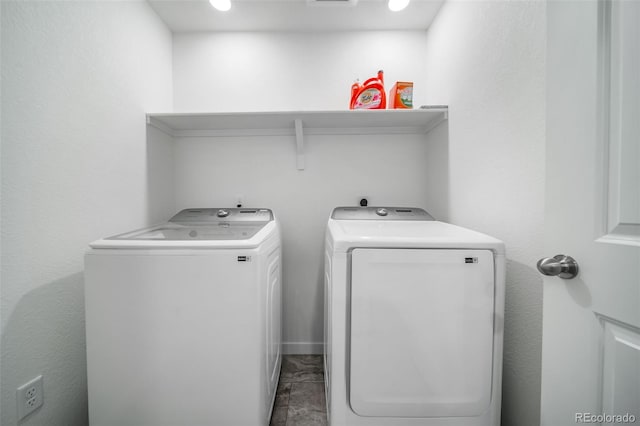 washroom with laundry area and washer and clothes dryer