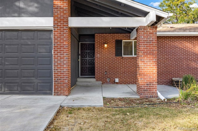 property entrance with a garage