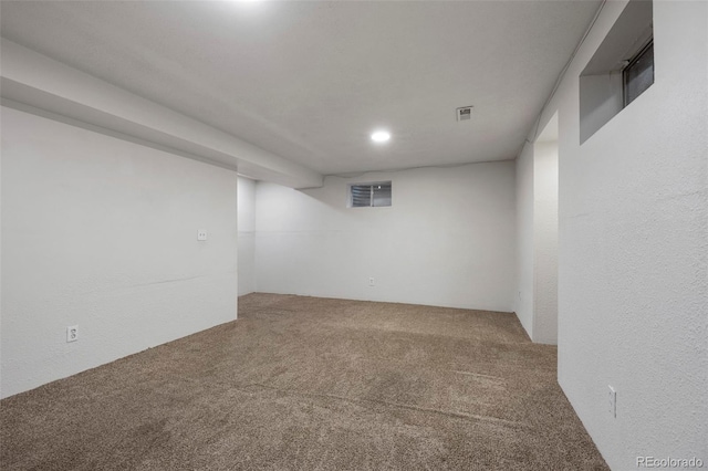 basement with carpet flooring