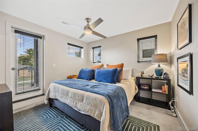 1302 N Stuart St, Denver, CO 80204 - bedroom with carpet, access to outside, and a ceiling fan