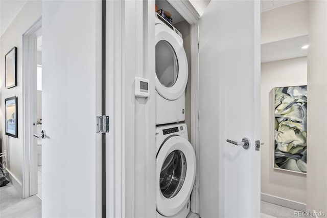 1302 N Stuart St, Denver, CO 80204 - washroom featuring stacked washing machine and dryer