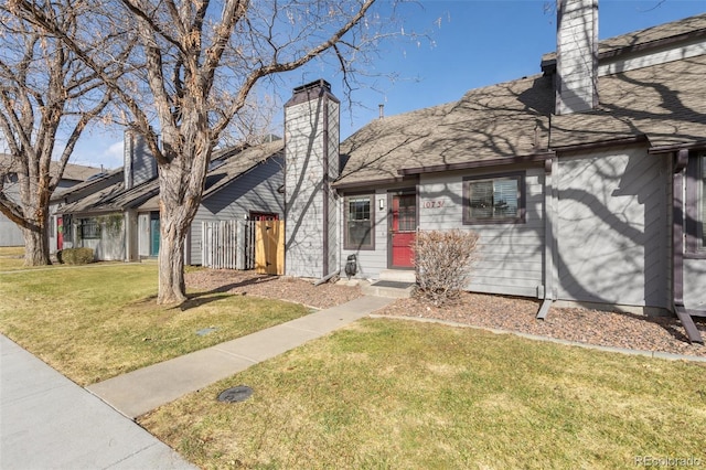 view of front of property with a front lawn