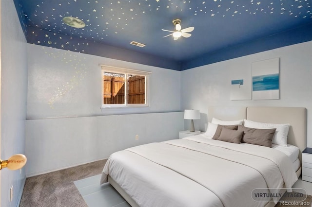 bedroom featuring carpet floors and visible vents
