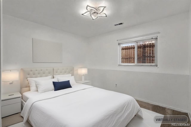 bedroom with visible vents