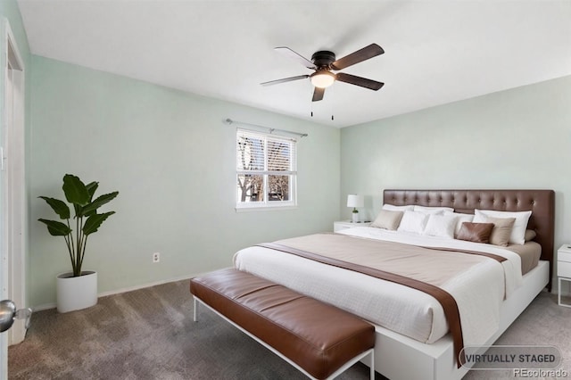 carpeted bedroom featuring baseboards and a ceiling fan