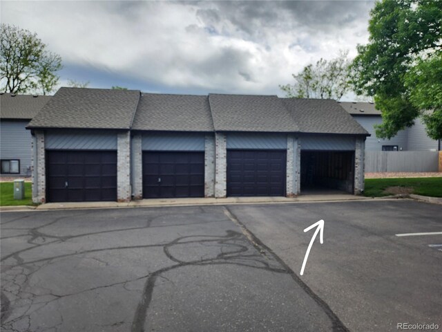 10731 W 63rd Ave Unit A, Arvada, CO 80004 - garage with fence