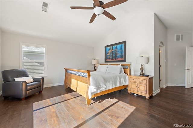 bedroom featuring lofted ceiling, dark wood-type flooring, and ceiling fan