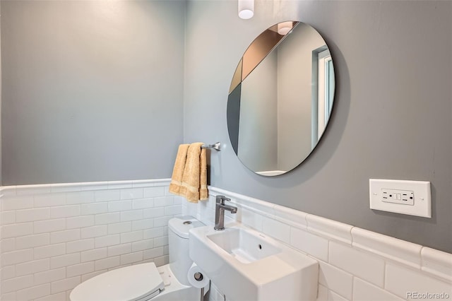 3530 E 8th Ave, Denver, CO 80206 - bathroom featuring a wainscoted wall and tile walls