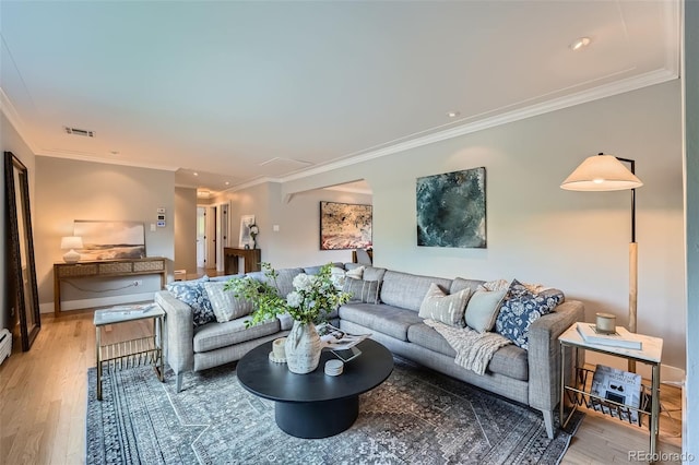 3530 E 8th Ave, Denver, CO 80206 - living area featuring ornamental molding and light wood-style floors