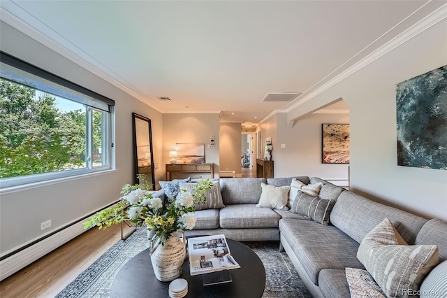 3530 E 8th Ave, Denver, CO 80206 - living room featuring wood finished floors, crown molding, and a baseboard radiator