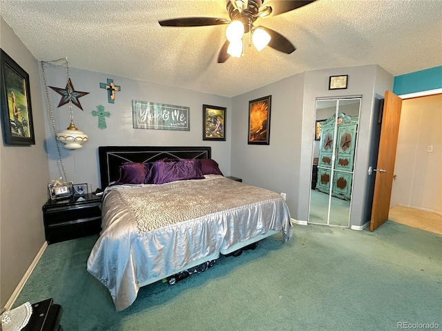carpeted bedroom featuring baseboards, a ceiling fan, a textured ceiling, and a closet