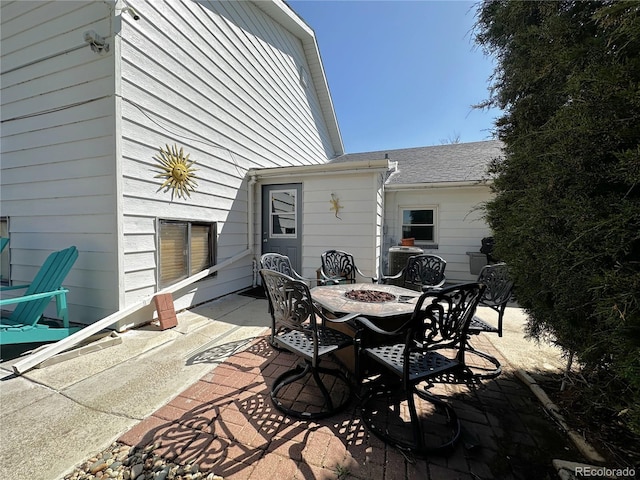 view of patio / terrace featuring a fire pit