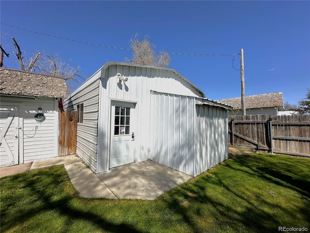 view of shed featuring a fenced backyard