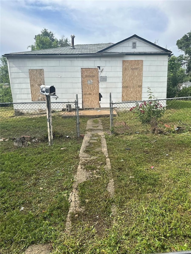 view of outbuilding with fence