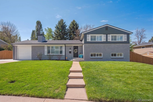 8242 E Briarwood Pl, Centennial, CO 80112 - split level home with an attached garage, a chimney, concrete driveway, and brick siding