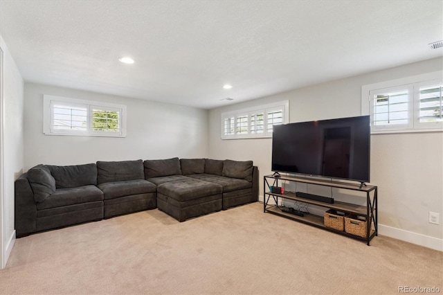 8242 E Briarwood Pl, Centennial, CO 80112 - living area featuring carpet flooring, plenty of natural light, recessed lighting, and baseboards