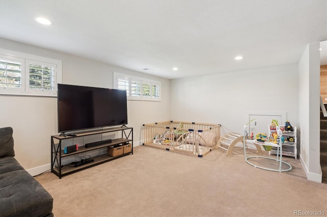 8242 E Briarwood Pl, Centennial, CO 80112 - living area featuring carpet flooring, recessed lighting, and baseboards