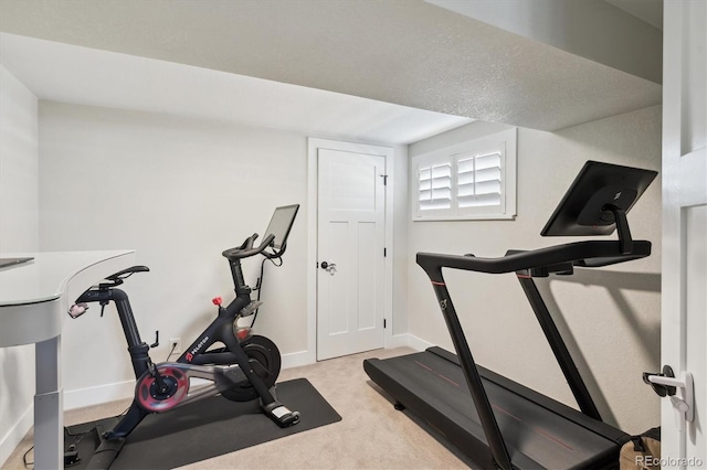8242 E Briarwood Pl, Centennial, CO 80112 - exercise area with baseboards and carpet flooring