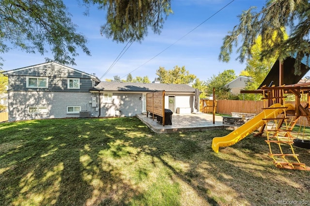 8242 E Briarwood Pl, Centennial, CO 80112 - rear view of property with a playground, a patio, and central air condition unit