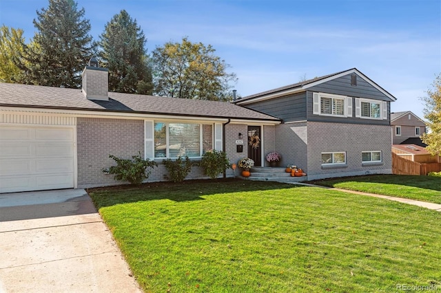 8242 E Briarwood Pl, Centennial, CO 80112 - split level home featuring a garage, brick siding, a chimney, and concrete driveway