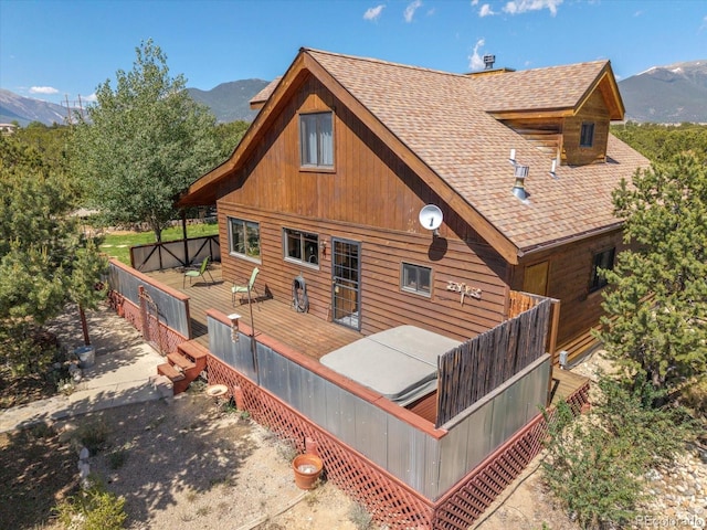 15700 County Road 352, Buena Vista, CO 81211 - rear view of house featuring a deck with mountain view and roof with shingles