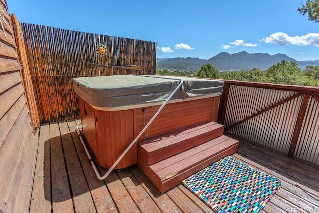 15700 County Road 352, Buena Vista, CO 81211 - wooden deck with a hot tub and a mountain view