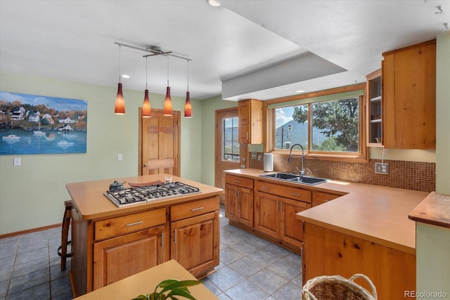 15700 County Road 352, Buena Vista, CO 81211 - kitchen with stainless steel gas cooktop, light tile patterned floors, backsplash, light countertops, and recessed lighting