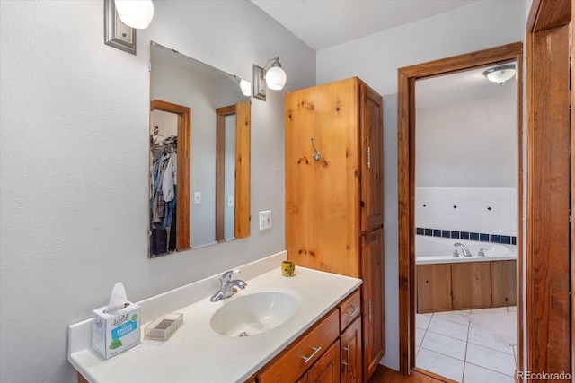 15700 County Road 352, Buena Vista, CO 81211 - full bathroom featuring vanity, a garden tub, and tile patterned floors