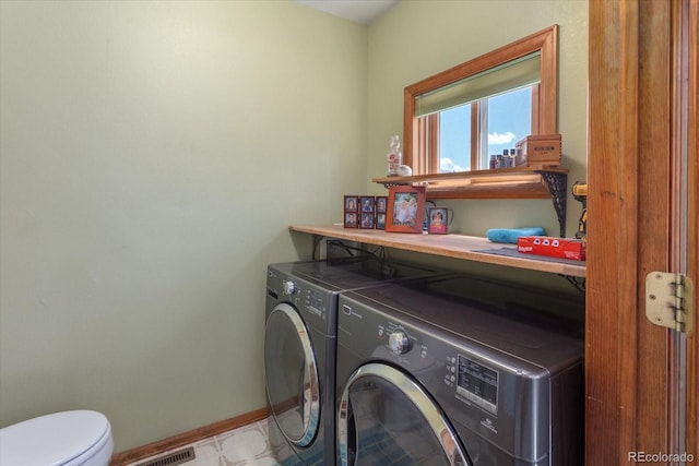 15700 County Road 352, Buena Vista, CO 81211 - laundry room featuring washing machine and clothes dryer and baseboards