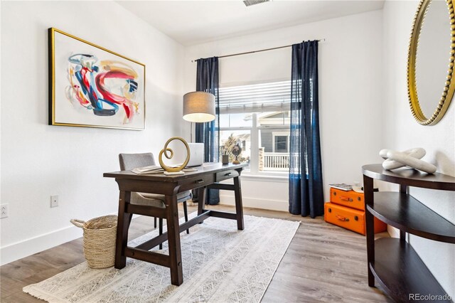 home office featuring light wood-type flooring