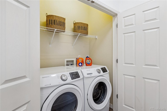 laundry room featuring washer and clothes dryer