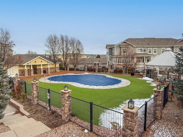 view of pool featuring a gazebo, a patio, and a lawn