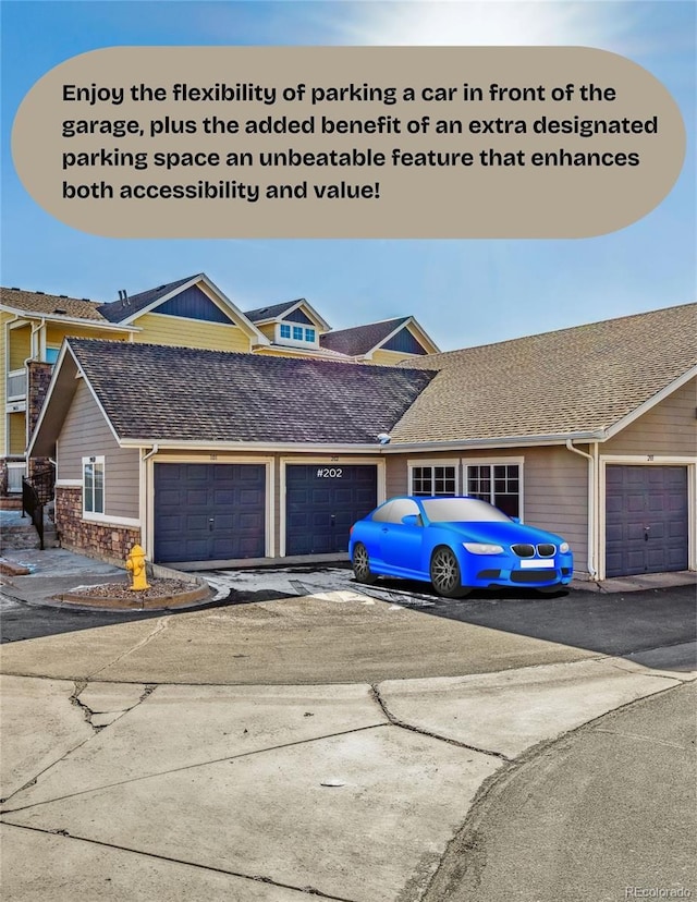 9471 Ashbury Cir Unit 202, Parker, CO 80134 - view of front facade with an attached garage, driveway, and a shingled roof