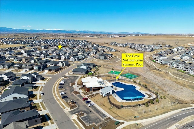 aerial view featuring a mountain view and a residential view