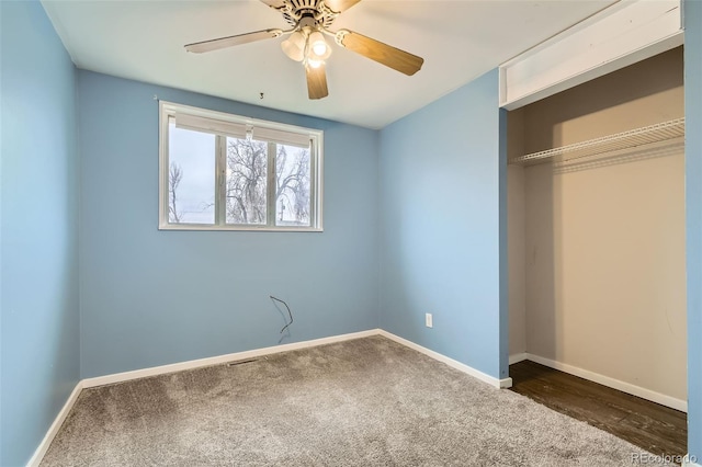 unfurnished bedroom with carpet, baseboards, a closet, and ceiling fan