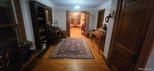 corridor featuring light hardwood / wood-style flooring