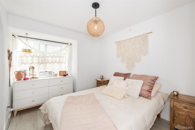 661 Snowberry St, Longmont, CO 80503 - bedroom featuring light wood-style flooring