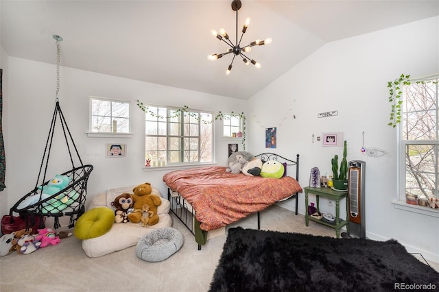 661 Snowberry St, Longmont, CO 80503 - carpeted bedroom with vaulted ceiling and a notable chandelier