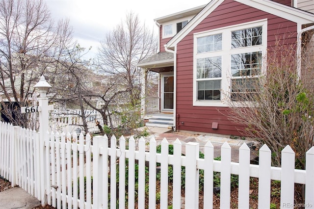 661 Snowberry St, Longmont, CO 80503 - view of front of home with a fenced front yard